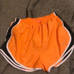 Orange Nike shorts